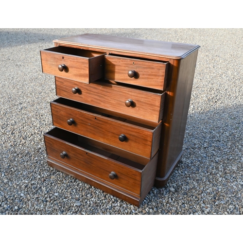 28 - A Victorian mahogany chest of two short over three long graduated drawers with turned handles, the b... 