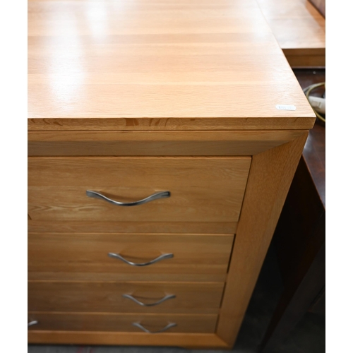 374 - A contemporary light oak chest of two short over three long drawers, 90 cm wide x 45 cm deep x 94 cm... 