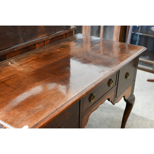 381 - A 19th century mahogany dressing table with three drawers around shaped niche raised on cabriole sup... 