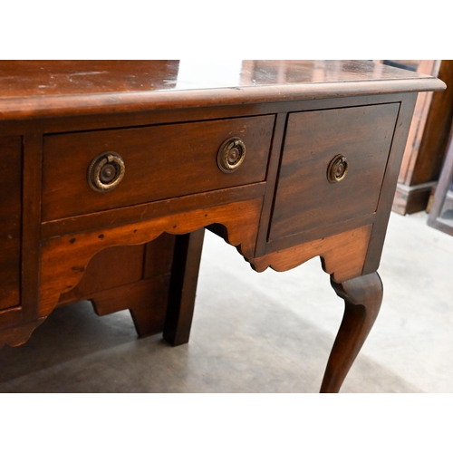 381 - A 19th century mahogany dressing table with three drawers around shaped niche raised on cabriole sup... 