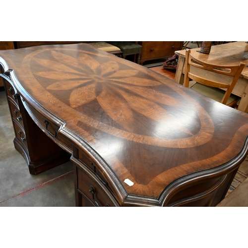 388 - A Continental mahogany twin-pedestal desk with marquetry top over seven drawers, 148 x 78 x 76 cm hi... 