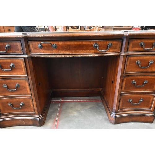 388 - A Continental mahogany twin-pedestal desk with marquetry top over seven drawers, 148 x 78 x 76 cm hi... 