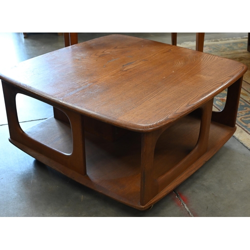 390 - An Ercol (attributed/unmarked) elm Pandora coffee table, with two drawers and open sides on casters,... 