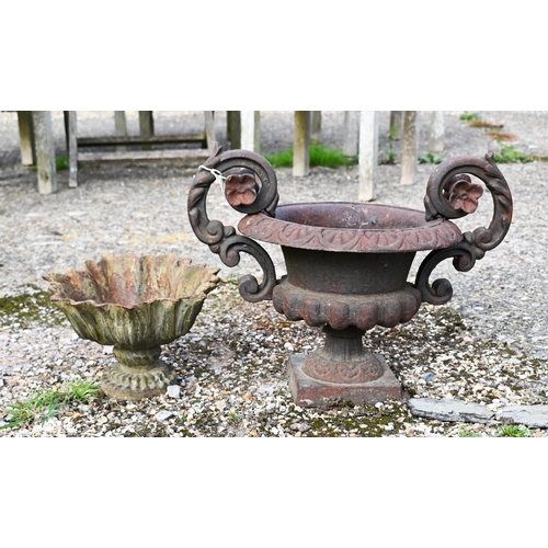 4 - A weathered classical cast iron urn planter to/with another of organic form (2)