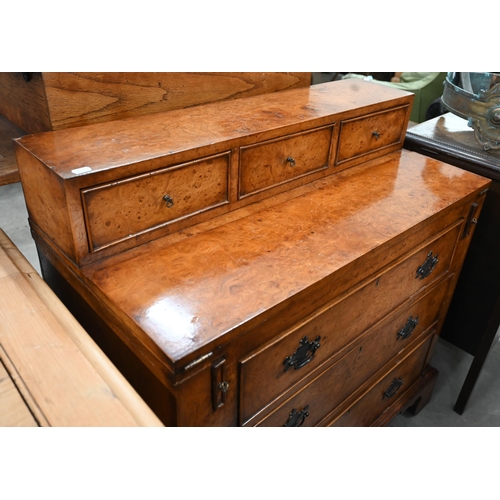 406 - A burr walnut writing desk chest of three drawers and a folding top with gilt tooled green leather s... 