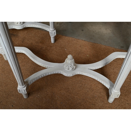 417 - A pair of French style console tables, the rosette carved frieze on fluted supports united by stretc... 