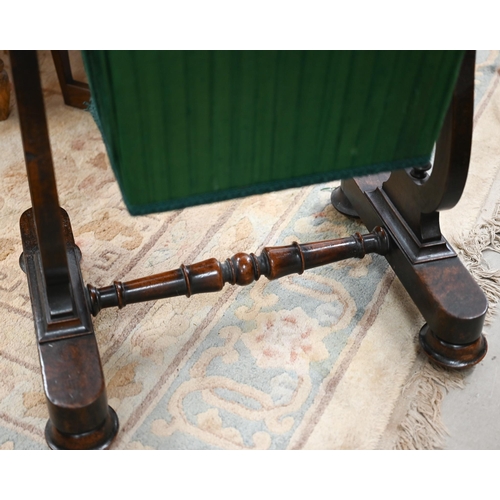 419 - A Victorian rosewood sewing table with frieze drawer and pleated fabric box drawer on lyre supports,... 