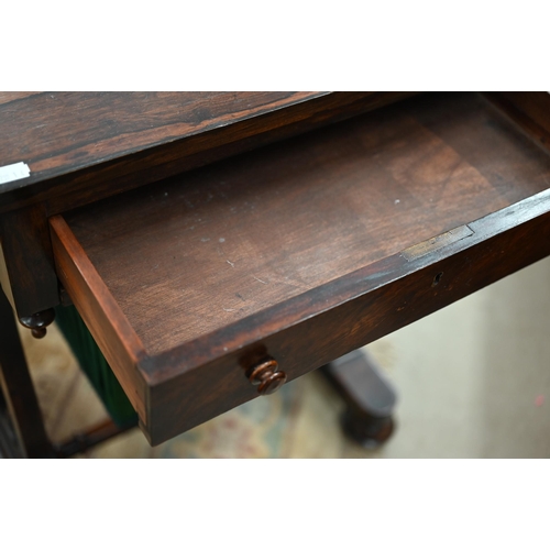 419 - A Victorian rosewood sewing table with frieze drawer and pleated fabric box drawer on lyre supports,... 