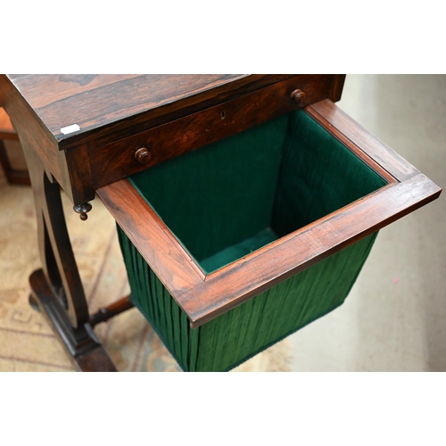 419 - A Victorian rosewood sewing table with frieze drawer and pleated fabric box drawer on lyre supports,... 