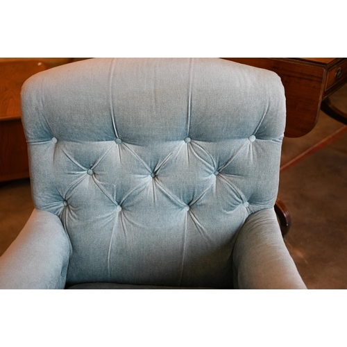 422 - A 19th century mahogany framed country house low armchair in blue dralon button back upholstery, 98 ... 