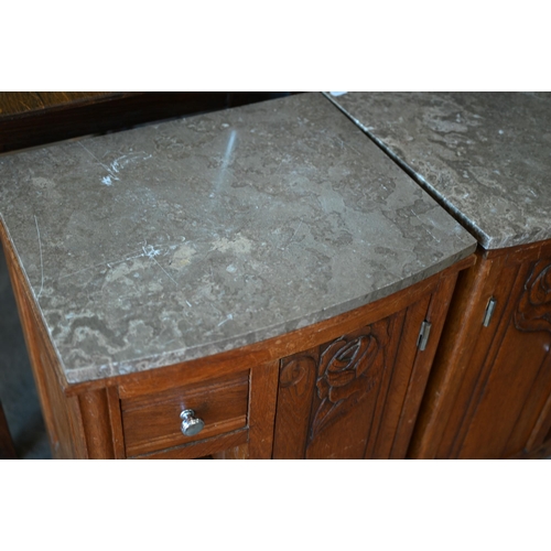 424 - A pair of mid 20th century floral carved oak bedside cabinets with grey marble tops, 46 cm x 38 cm d... 