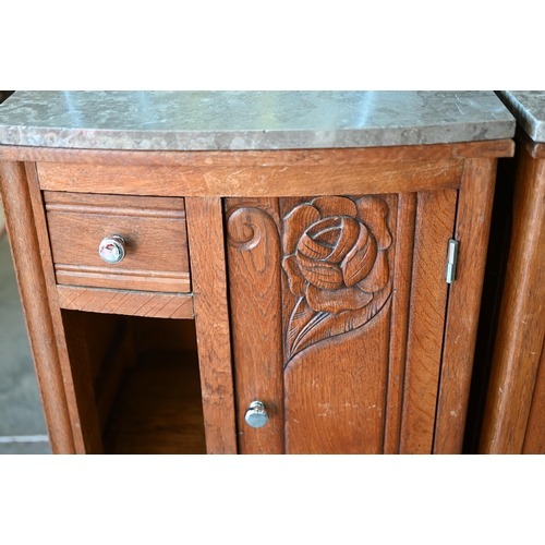 424 - A pair of mid 20th century floral carved oak bedside cabinets with grey marble tops, 46 cm x 38 cm d... 