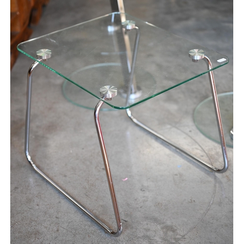 425 - A pair of contemporary  glass and chrome circular side tables 43cm diam to/w a similar square exampl... 