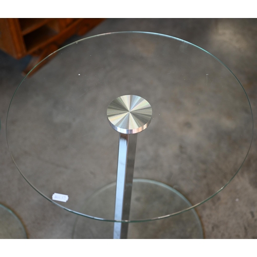 425 - A pair of contemporary  glass and chrome circular side tables 43cm diam to/w a similar square exampl... 