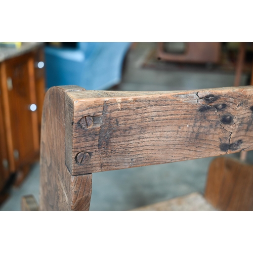 428 - An antique elm hall chair