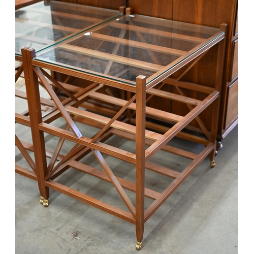 435 - A pair of lattice wood side tables with glass tops with brass castors, 50 cm wide x 70 cm deep x 72 ... 