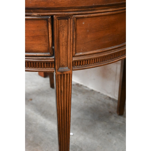 438 - A French style quarter-veneered walnut circular lamp table with frieze drawer, tapering square suppo... 