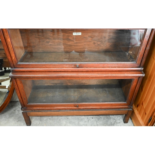 440 - An early 20th century oak Globe Wernick sectional bookcase with three glazed compartments, 90 cm wid... 