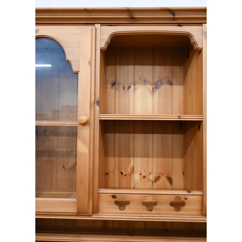 442 - A Ducal stained pine dresser, 130 cm wide x 44 cm deep x 190 cm high