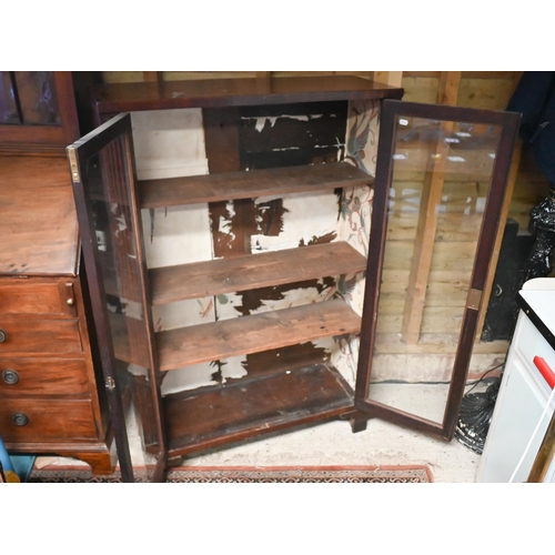 452 - # An Art Deco mahogany display cabinet, with two glazed panel doors, raised on shaped bracket feet, ... 