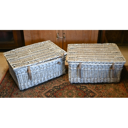 456 - A pair of wicker laundry trunks, later painted white (2)