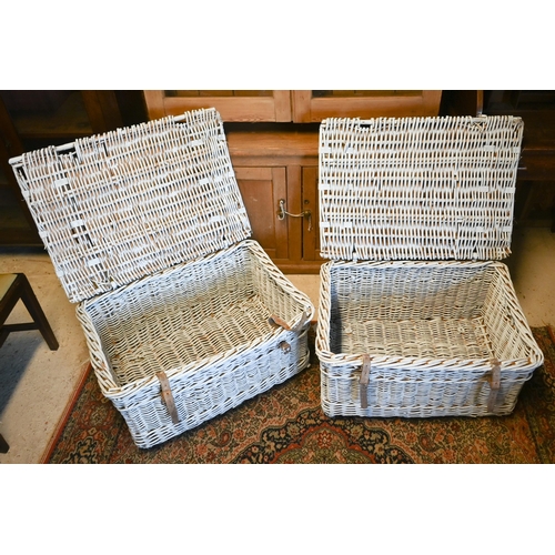 456 - A pair of wicker laundry trunks, later painted white (2)