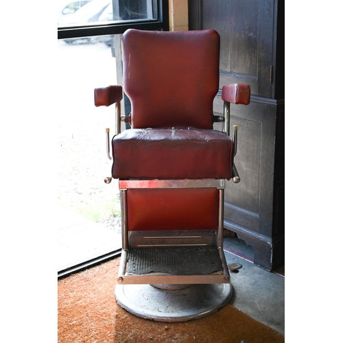 460 - A vintage red vinyl barber's chair, a/f