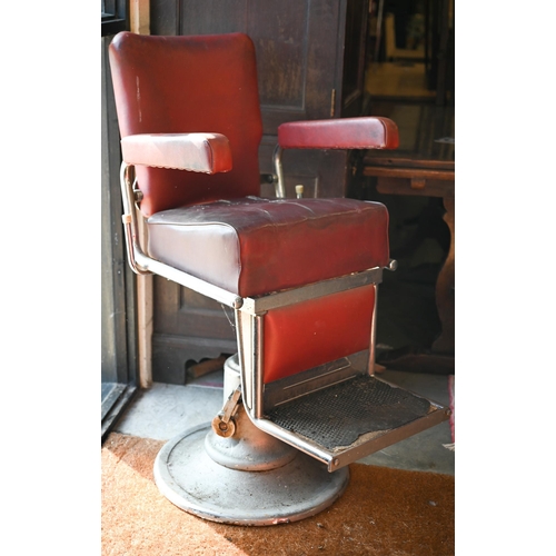 460 - A vintage red vinyl barber's chair, a/f