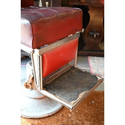 460 - A vintage red vinyl barber's chair, a/f