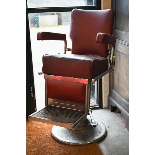 460 - A vintage red vinyl barber's chair, a/f