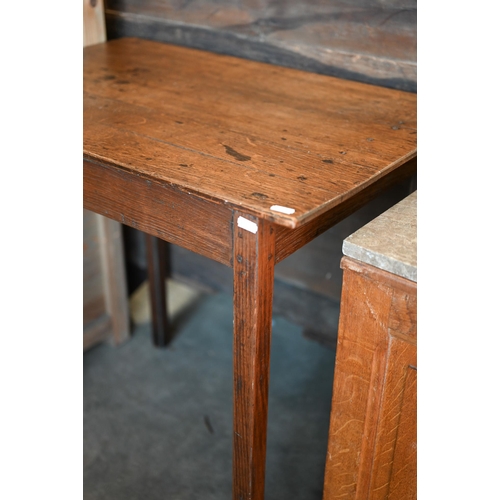 461 - An oak side table on slender square supports