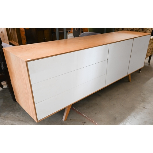 477 - A large modern sideboard with three drawers and two cupboards, 200cm wide