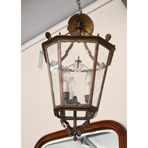 491 - A hanging lantern with three fittings and etched glass floral design 58cm high approx