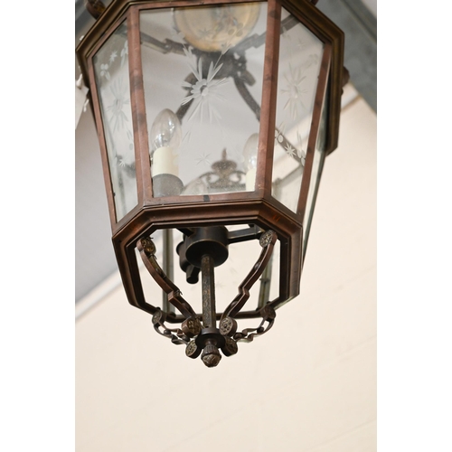 491 - A hanging lantern with three fittings and etched glass floral design 58cm high approx