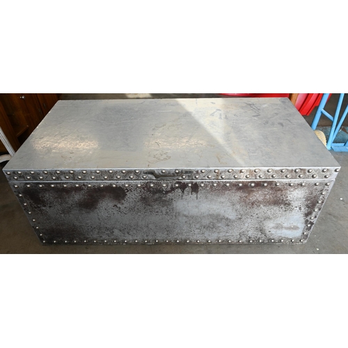 493 - A studded metal trunk, 122cm wide