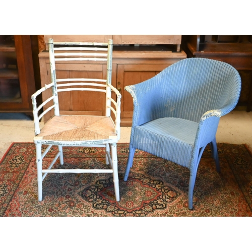 516 - A blue-painted Lloyd Loom armchair, to/w a simulated bamboo armchair with rush seat (2)