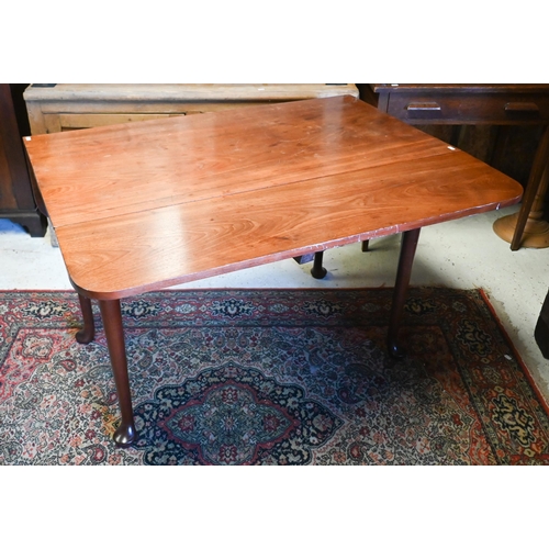 517 - # A mahogany drop-leaf dining table on turned supports and pad feet, 110 x 101cm