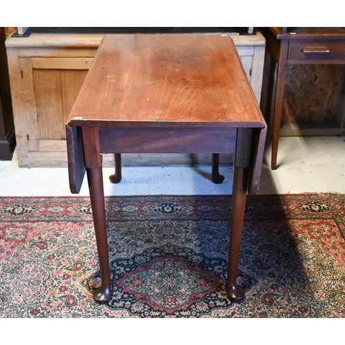 517 - # A mahogany drop-leaf dining table on turned supports and pad feet, 110 x 101cm