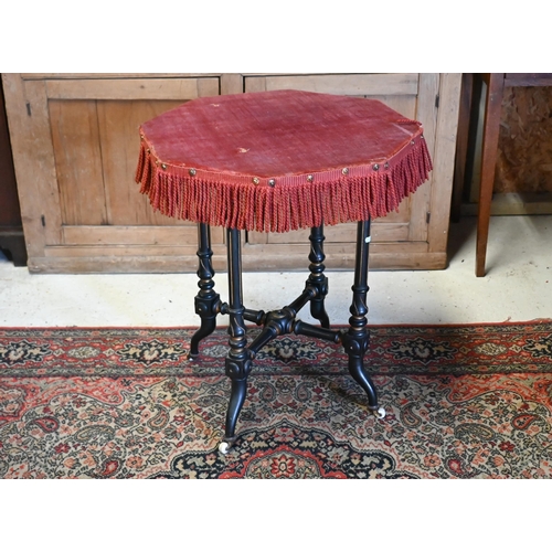 520 - Octagonal 'Gypsy' table with red velvet top on ebonised and gilded base, 55cm,