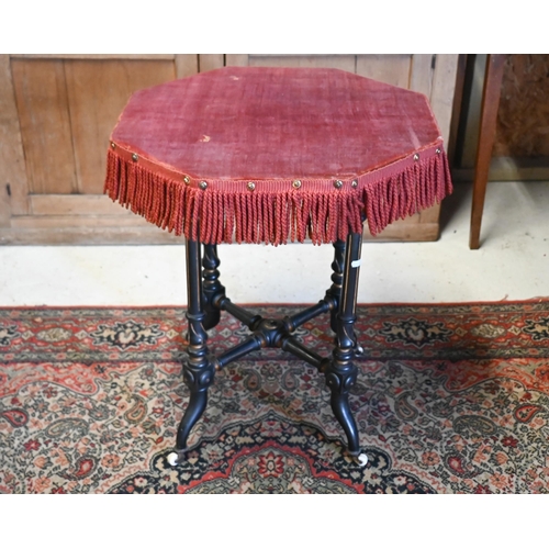 520 - Octagonal 'Gypsy' table with red velvet top on ebonised and gilded base, 55cm,