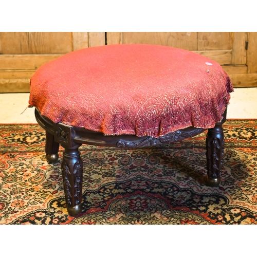 522 - # A stool with padded circular seat, on brass ball feet