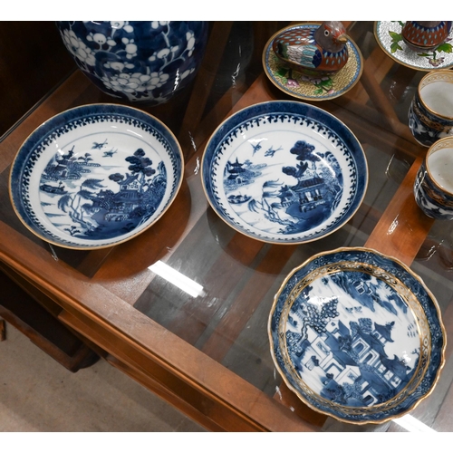 64 - A pair of early 19th century Chinese blue and white saucer-dishes 14 cm to/w two similar coffee cups... 