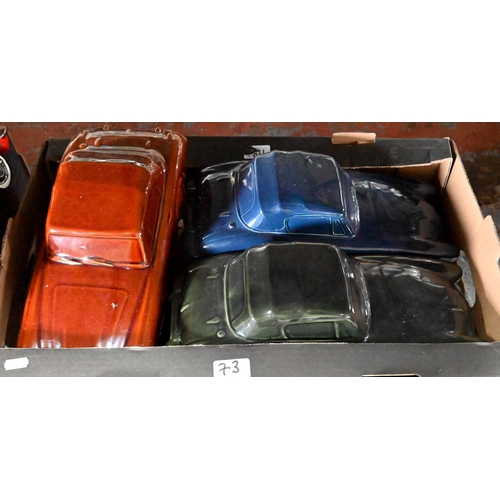 73 - Three boxes of novelty ceramic model vehicles - including moeny-boxes (3)