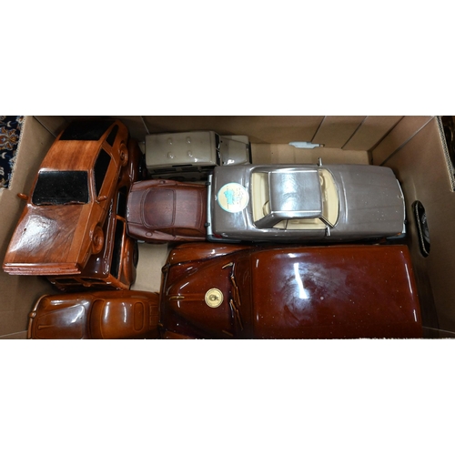 75 - Three boxes of novelty ceramic, metal and other model vehicles including money-boxes etc (3)