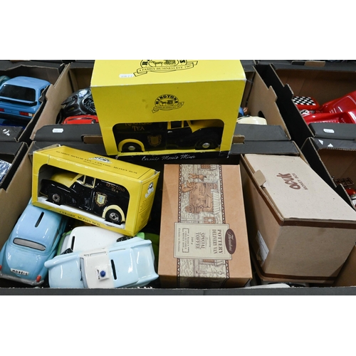 79 - Three boxes of novelty ceramic model vehicles including money-boxes, egg-cups, etc - some boxed (3)