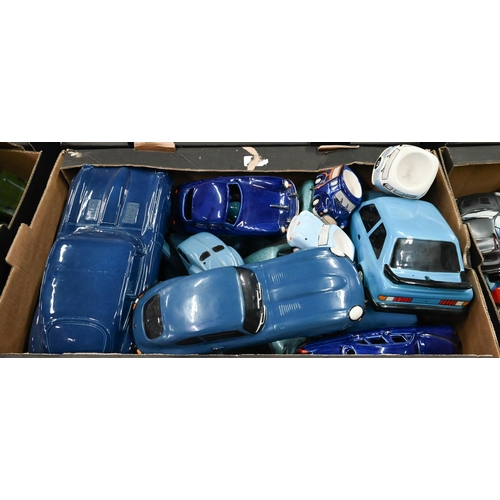 79 - Three boxes of novelty ceramic model vehicles including money-boxes, egg-cups, etc - some boxed (3)