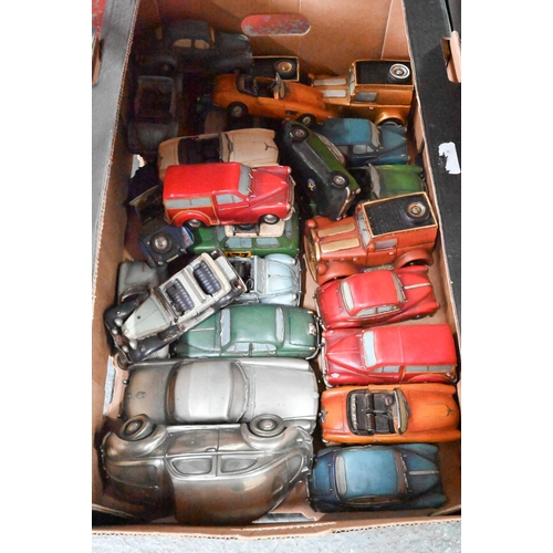 80 - Four boxes of novelty ceramic model vehicles, money boxes - some bxoed etc