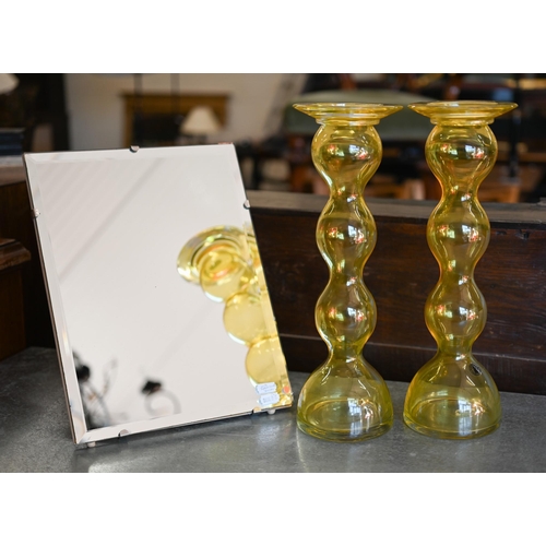 90 - A pair of Anne Nillson (Sweden) design yellow glass baluster candlesticks 36 cm to/w an unframed eas... 