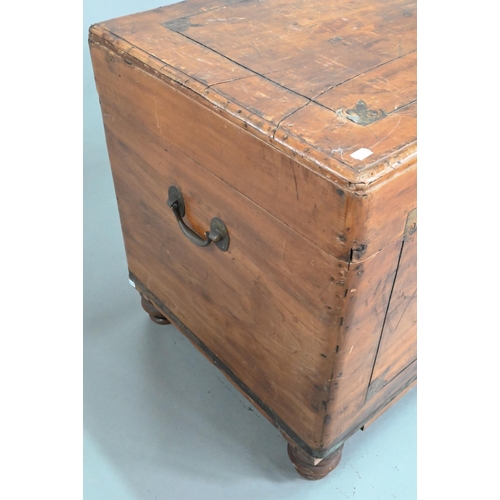 39 - A late 19th century part brass inlaid camphorwood campaign trunk, raised on turned feet, brass handl... 