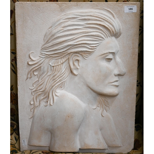 391 - A cast stone relief plaque of a female profile, incised on reverse D Longman 2013 V, and impressed f... 